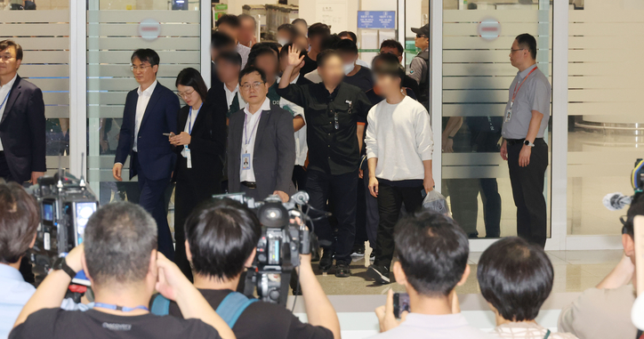 <strong>미국에서 귀국한 한국근로자들 / 연합뉴스</strong>